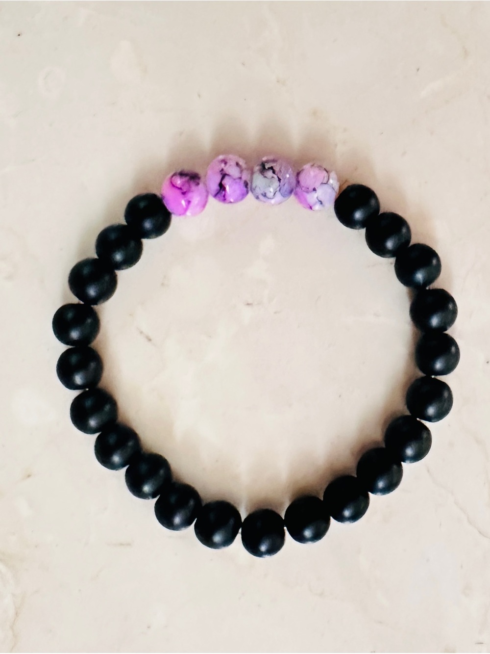 Black Beaded Bracelet with Pink Marble Accent -
